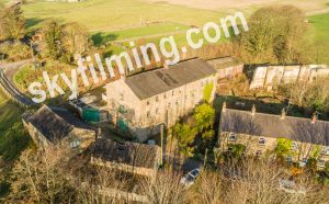 Drone aerial photograph of historic mill building near Harrogate in North Yorkshire